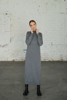 This long knitted turtle-neck dress is made of merino wool. Ruffled sleeves, ruffled bottom and straight loose type of the dress makes it super comfortable and stylish at the same time. This merino wool sweater type dress is also perfect for minimalists. MONALA Monala knitwear is handmade, each piece of garment is unique and will perfectly fit for those women who want to maintain their wardrobes minimalistic, basic and versatile. PRODUCTION The dress is made of 100% merino wool, using a manual k Long Sleeve Wool Sweater Dress For Work, Long Wool Sweater Dress For Fall, Long Wool Sweater Dress For Winter, Gray Midi-length Sweater Dress For Fall, Elegant Gray Sweater Dress For Fall, Winter Cashmere Midi Dress, Fall Wool Sweater Dress, Winter Cashmere Sweater Dress, Elegant Wool Sweater Dress For Winter