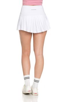 NEW 2.0 Off-White Pleated Tennis Skirt is back and BETTER than ever. Now offering more sizes and sizing accuracy. Just like the original, it is best everyday piece to add to your wardrobe because of its versatility & functionality. The skirt features built-in spandex shorts that include a comfortable fit and side pockets for storage. This exclusively designed Gold Hinge skirt is made of quick dry material and can take on any activity such as golf, tennis, running and more. NEW & Improved Accurat Summer White Tennis Skirt With Built-in Shorts, Cheerleading Mini Skirt Bottoms With Built-in Shorts, Cheerleading Skirt With Built-in Shorts, Fitted Mini Skirt With Built-in Shorts For Cheerleading, Cheerleading Mini Skirt With Built-in Shorts, Sporty Pleated Mini Bottoms, Sporty Pleated Mini Length Bottoms, White 4-way Stretch Skirt With Built-in Shorts, Sporty White Stretch Pleated Skirt