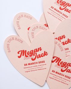 five heart shaped save the dates cards