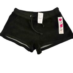 Nwt- So Nikki Black Terrycloth Shorts. Front Tie Closure 100% Cotton Soft And Comfortable Length: 9.5" Waist: 13" Inseam: 2" Brand New. Perfect Condition. Black Pajama Shorts With Elastic Waistband, Black Elastic Waistband Pajama Shorts, Black High Waist Shorts For Loungewear, Black Athletic Shorts For Loungewear With Short Inseam, Black Bottoms With Short Inseam For Loungewear, Black Lounge Shorts With Short Inseam, Black Loungewear Shorts With Short Inseam, Black Shorts For Loungewear With Short Inseam, Trendy Black Cotton Pajama Shorts