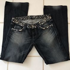 These Are Fantastic! They Have Silver Studs And Black Crystals Mounted In Silver Covering The Whole Waist Band, Going Across The Front Pockets And Covering The Full Flap On Back Pockets. The Are A Dark Blue Distressed With Flare Legs. They Have 32in Inseam. They Have Never Been Worn Or Cleaned. The Distressing Is Great Too. They Are Definitely Some Something Special Jeans Jeans With Crosses On Them, Blingy Jeans, Thrift Manifestation, Special Jeans, Bedazzled Jeans, Rock Jeans, Flair Jeans, Black Clothes, Only Jeans