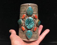 REDUCED from $3800 WOW!  Museum quality piece Tibetan cuff from Nepal... multi stone, with 5 pcs bezel set varied fine Chinese turquoise & 4 pcs bezel set fine coral, & absolutely incredible sterling silver overlay work - SO INTRICATE - in a stunning allover repeat pattern or motif that resembles ammonites or spirals or waves... Holy Moly!  Just awesome!  & surprisingly unsigned, so it certainly has some age.   388 grams 5.25" long, tapering from 7 5/8" plus 1 7/16" gap at forearm, to 6 7/8" plu Unique Spiral Turquoise Jewelry, Holy Moly, Repeat Pattern, Coral Turquoise, Multi Stone, Cuff Bracelets, Fine Jewelry, Coral, Cuff