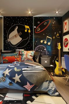 a bed room with a neatly made bed next to a guitar and musical instruments on the wall