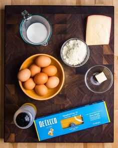 eggs, cheese, butter and other ingredients on a table