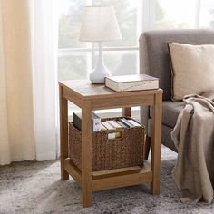 a living room scene with focus on the end table and basket next to the couch