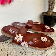 Beautiful handmade Huaraches. They are the best quality that can be found in huaraches. They are completely handmade, making them totally unique in style. These beautiful shoes can be worn with a dress as well as with a pair of jeans and you will look unique and fashionable. How to order your size: Example, if you wear size 6.5 ask for size 6. If you wear size 6 ask for 6. The huarache molds to your feet with use, they stretch. Note: Size changes are accepted. If you need a change in numbering, Artisan Open Toe Sandals In Natural Color, Bohemian Flat Sandals With Rubber Sole, Summer Beach Huaraches With Leather Sole, Artisan Sandals With Rubber Sole For Festival, Beach Huaraches With Leather Sole In Natural Color, Artisan Open Toe Huarache Sandals For Beach, Artisan Sandals For Vacation, Artisan Sandals With Single Toe Strap For Beach, Artisan Adjustable Huarache Sandals