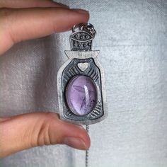 Amethyst necklace, potion bottle necklace, amethyst pendant, amethyst jewelry, fabricated pendant, sterling silver, ooak crystal necklace by ZebaJewelry on Etsy https://www.etsy.com/listing/763222488/amethyst-necklace-potion-bottle-necklace Potion Bottle Necklace, Necklace Amethyst, Bottle Necklace, Potion Bottle, Amethyst Jewelry, Amethyst Necklace, Amethyst Pendant, February Birth Stone, Birthstone Jewelry