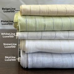 four folded sheets are stacked on top of each other, with the names labeled below