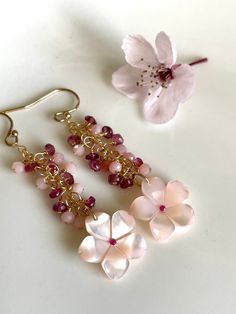 "Petite, lightweight earrings in 14K gold-fill, measuring only 2\" long, these are nevertheless stunners with clusters of tiny rondelles of pink opal and pink tourmaline, culminating with these mother of pearl cherry blossoms. Your jewelry will come gift-boxed, and gift-wrapping is available upon request.  Thank you for checking out my shop!" Handmade Pink 14k Gold-filled Earrings, Handmade Pink 14k Gold Filled Earrings, Pink 14k Gold-filled Wire Wrapped Earrings, Pink 14k Gold Filled Drop Earrings, Pink 14k Gold Filled Jewelry For Wedding, Pink Dainty 14k Gold Filled Earrings, Cherry Blossom Earrings, Lightweight Earrings, Pink Opal