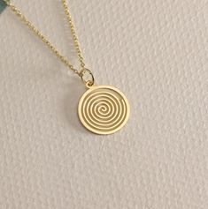 14K Real Solid Gold Spiral gold necklace ● Material of pendant: Solid Gold 14k ( REAL GOLD ) ● Metal Stamp: 14L ( REAL GOLD ) ● The pendant is available in 6 sizes: - 14,0 mm / 0,55 inches ( Diameter ) In the photos - 15,3 mm / 0.60 inches ( Diameter ) - 16,5 mm / 0,65 inches ( Diameter ) - 19,1 mm / 0,75 inches ( Diameter ) - 21 mm / 0,82 inches ( Diameter ) - 23 mm / 0.90 inches ( Diameter ) ( In the photos the size is 14mm / 0.55 inches Diameter ) ( Jump Ring inner diameter: 4 mm ) ● Material Yellow Gold Swirl Jewelry Gift, Swirl Shaped Yellow Gold Jewelry Gift, Minimalist 14k Gold Spiral Jewelry, Swirl Shaped Sterling Silver Jewelry In Gold Color, Gold Spiral Jewelry, Minimalist Gold Spiral Jewelry, Spiral Rose Gold Jewelry Gift, Gold Plated Spiral Jewelry, Spiral Gold-plated Jewelry