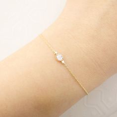 * One rose cut diamond bracelet * Natural rose cut diamond approx. 0.10-0.15ct gh, vs-s * Two natural accent diamonds, 0.02ctw * Solid 14k gold chain adjustable at 6.5" or 7" * Spring ring clasp closure * Ethically sourced solid 14k yellow gold and gemstones * Packaged in a recyclable kraft jewelry box Dainty Rose Gold Bracelet With Brilliant Cut, Delicate Diamond Bracelet For Anniversary, Yellow Gold Bracelets With Rose Cut Diamonds For Gift, Delicate Diamond Bracelet With Accents For Anniversary, Fine Jewelry Anniversary Bracelet With Rose Cut Diamonds, Delicate Diamond Chain Bracelet With Diamond Accents, Delicate Diamond Chain Bracelet With Accents, Delicate Diamond Jubilee Bracelet, Delicate Anniversary Diamond Bracelet With Accents