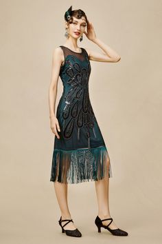 Find the vintage inspired 1920s Flapper dresses in BABEYOND. These authentic Gatsby themed dresses are designed to recall the classic. Always remember - truly eternally stylish flapper dresses would never go wrong. Free shipping on orders over $100 and 14-day unconditional return. Festive Green Dress With Tassels, Festive Green Tassel Dress, Flapper Style Embellished Evening Dress, Festive Gatsby Style Sequin Dress, Fitted Flapper Dress With Tassels For Cocktail, Fitted Flapper Dress With Tassels For Party Season, Fitted Flapper Dress With Tassels For Evening, Fitted Tassel Flapper Dress For Evening, Elegant Festive Dress With Tassels