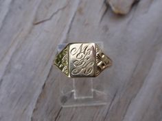 Victorian 10k yellow gold signet ring.  This sweet lady weighs 2.6g, is a size 6 1/4 & measures 10mm at the highest point front center.  She is engraved with cursive initials M F K along a pretty designs along the sides.  All items are in previously loved, used condition so please review all photos closely and let me know if you have any questions prior to purchasing. I'm not a jeweler or gemologist & I pass on all information available to me. As always, I offer free USPS Ground Advantage (formerly called First Class) shipping with tracking to US. And yes! We accept layaway payment plans. RETURN POLICY: I DO accept returns as I want all of these sweet treasures to find happy new homes and I will accept a return if I am notified within 3 days of the USPS delivery confirmation & the item is Collectible Yellow Gold Signet Ring With Initials, Personalized Engraved Yellow Gold Ring For Collectors, Antique 14k Gold Initial Ring, Antique 14k Gold Initial Ring As Gift, Antique Style 14k Gold Initial Ring As Gift, Personalized Yellow Gold Signet Ring Collectible, Heirloom 14k Gold Jewelry With Maker's Mark, Victorian Yellow Gold Initial Ring For Anniversary, Classic Yellow Gold Jewelry With Maker's Mark