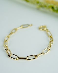 14K Solid Gold Paper Clip Bracelet, Gold Paperclip Chain Wristband, Real Gold Bracelet, Rectangle Chain, Chic Chain Bracelet, Dainty Bracelet, Chic Gift for Her, Gift for Valentine, Delicate Bracelet - With our 30 years of experience in the gold and jewelry industry, it is a great source of pleasure for us to produce useful jewelry that you can wear with pleasure. - Every woman is special. And all women are more precious to us than any jewel. I wish you a pleasant shopping experience. - Thank yo Paper Clip Bracelet Gold, Paperclip Chain Bracelet, Gold Rectangular Paperclip Bracelet With Adjustable Chain, Classic Paperclip Bracelet With Rectangular Solid Links, Classic Paperclip Bracelet With Solid Link Construction, Rectangular Yellow Gold Chain Bracelet With Lobster Clasp, Formal Rectangular Chain Bracelet With Lobster Clasp, Yellow Gold Rectangular Chain Bracelet With Lobster Clasp, Modern Rectangular Paperclip Chain Bracelet