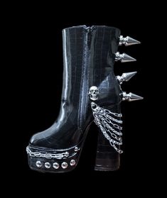 This listing is for this pair of black goth/punk style spiked 6 inches high heel women's boots .available i uk women's size 5 and 6. Made with shiny patern high quality pu leather studded with 44 mm aluminium tree spikes and skulls, accessorised with stainless steel multi-layer chains. Size: uk women's 5 and 6 Material: EVA Style: Punk / Goth The boots itself is not manufactured by me . I did the modifications with metal Embellishments and spikes of my choice . This is a made to order item retur Edgy Knee-high Heeled Boots For Streetwear, Fall Punk Knee-high Platform Boots, Punk Knee-high Platform Boots For Fall, Leather Punk Platform Boots For Club, Punk Leather Platform Boots For Club, Punk Boots With Chunky Platform And Pointed Toe, Punk Style Platform Heeled Boots With Round Toe, High Heel Halloween Party Boots, High Heel Boots For Halloween Party