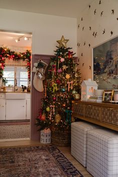 a decorated christmas tree in a living room