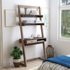 a bedroom with a bed, desk and shelves on the wall next to a window