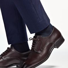 These classic brown derby lace-ups are crafted with a full leather sole and lining from supple calf leather. Brown Goodyear Welted Lace-up Derby Shoes, Timeless Goodyear Welted Leather Lace-up Shoes, Derby Oxfords With Branded Insole And Calf Leather, Calf Leather Oxfords With Branded Insole For Derby, Calf Leather Lace-up Dress Shoes For Semi-formal, Brown Lace-up Derby Shoes For Business, Timeless Brown Lace-up Oxford Shoes, Timeless Brown Oxford Lace-up Shoes, Brown Lace-up Derby Shoes With Leather Sole