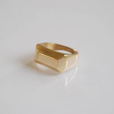 Gold Signet Ring, Signet Ring Women's, Gold Rings For Women, 14k Gold Ring, Geometric Ring, Unique Gifts For Women, Valentines Gifts For Women This signet ring is a flat top ring, a rectangular shaped. I designed this signet ring in an elegant geometric form.  This signet ring is a beautiful statement ring, made of solid 14k gold. This signet ring has a strong presence. This ring is a beautiful pick up for a daytime apparel and perfect for a night out in town.  This 14k gold ring makes a genuine statement that can not be ignored! I sculptured this ring in wax to perfection and molded it in one piece.  The ring has a classic shape that combines comfort and beauty to make this jewelry perfect for you or anyone you care!   Features  ❇ Made of solid 14k yellow/white/rose gold (Choose during ch Signet Rings Women Gold, Ring Geometric, Gold Rings For Women, Signet Rings Women, Small Business Gifts, Signet Rings, Gold Statement Ring, Top Rings, Gold Signet Ring