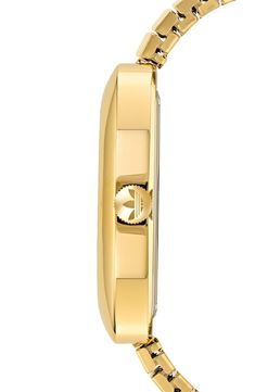 A golden case and matching bracelet create a clean, monochromatic style for this Trefoil-detailed watch marked by stick indexes on a wide, easy-to-read dial. Deployant clasp closure Quartz movement Stainless steel with goldtone ionic plate Imported Gold Watch Accessories With Subdials And Round Dial, Classic Gold Watch With Rectangular Dial, Gold Watches With Subdials, Gold Watch With Skeleton Dial, Classic Gold Watch Accessories With Polished Finish, Gold Watch Accessories With Skeleton Dial, Gold Skeleton Dial Watch Accessories, Gold Skeleton Dial Watch, Gold Minimalist Watch For Everyday Use