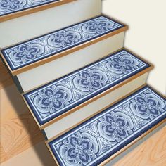 blue and white tile stair treads on wooden steps