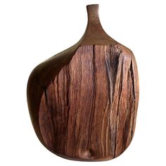 a wooden vase is shown on a white background