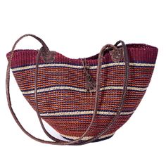 PRICES MAY VARY. Please note that given the unique handcrafted nature of each basket, there are no two alike. Colors and patterns will vary. Measurements may vary slightly. Fair-Trade handwoven bag, ethically sourced from our cooperatives in West Africa. Each basket is completely unique and the leather tag inside is personally signed by the weaver. Made with wild-harvested Savannah grass and leather wrapped handles and straps. Care and Use: To reshape your basket, spray lightly with water, shape Weaving Straw Bucket Bag For Market, Woven Leather Bucket Shoulder Bag For Market, Artisan Straw Bucket Bag For Everyday Use, Artisan Bucket Straw Bag For Everyday Use, Bucket Straw Bag With Weaving For Market, Market Bucket Straw Bag With Weaving, Weaved Bucket Bag For Market, Traditional Natural Woven Leather Shoulder Bag, Woven Natural Fiber Basket Bags