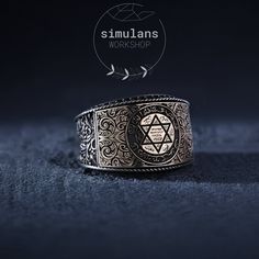 Embrace the mystique and elegance of this meticulously crafted ring, featuring the powerful Seal of Solomon. This exquisite piece is made from 925 sterling silver and adorned with intricate Ottoman motifs on the sides, embodying a rich historical essence. The centerpiece showcases the Seal of Solomon, surrounded by detailed engravings that enhance its mystical appeal. The edges are embellished with black zircon stones, adding a touch of sophistication and allure. Key Features: Material: 925 Ster Seal Of Solomon, Spiritual Enlightenment, Ancient Wisdom, Stackable Rings, Thoughtful Gifts, Spirituality, Jewelry Rings, Silver Rings, 925 Sterling Silver