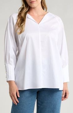 The simple style of this top cut from smooth, refined cotton with pleated sleeves gives it the versatility to easily cross from casual to styled-up looks with ease. 24 1/2" length Split neck Long sleeves with button cuffs 100% cotton Machine wash, dry flat Made in Turkey Classic Cotton Tops With Pleated Sleeves, Casual Pleated Tops For Daywear, Cotton Tops With Pleated Sleeves And Relaxed Fit, Chic Pleated Cotton Top, Fall Cotton Tops With Pleated Sleeves, Workwear Blouse With Pleated Sleeves, Classic Tops With Pleated Sleeves For Daywear, Solid Cotton Tops With Cuffed Sleeves, Relaxed Fit Tops With Pleated Sleeves For Daywear