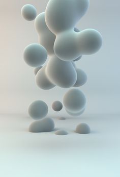 some white balls floating in the air on a gray background stock photo getty images