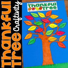 the thanksgiving tree is made out of colored paper and has words that spell out, thank you