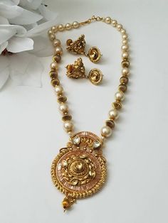 Check out this item in my Etsy shop https://www.etsy.com/listing/701925666/gold-necklace-indian-jewelry-indian Heavy Gold Pearl Necklace For Festivals, Gold Chandbali Pearl Necklace In Temple Jewelry Style, Gold Chandbali Pearl Necklace In Temple Style, Gold Chandbali Pearl Necklace With Intricate Design, Gold Pearl Necklace With Intricate Design For Diwali, Heavy Gold Pearl Necklace For Diwali, Diwali Gold Pearl Necklace With Intricate Design, Gold Pearl Necklace With Latkans Temple Style, Festival Gold Plated Chandbali Bridal Necklace