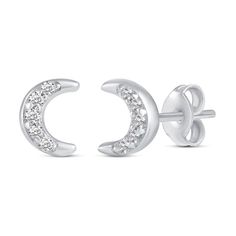 She'll love the celestial theme of this charming diamond three-pair stud earrings set. Crafted in sterling silver, this set features dainty diamond-touched earrings - one pair each of curved lightning bolts, crescent moons and four-pointed stars. Captivating with 1/10 ct. t.w. of diamonds and a bright polished shine, these earrings secure with push-screw backs. Hypoallergenic Crescent Sterling Silver Jewelry, Fine Jewelry Sterling Silver Moon Jewelry, Fine Sterling Silver Moon Jewelry, Silver Moon Shaped Diamond Jewelry, White Gold Crescent Sterling Silver Earrings, White Gold Sterling Silver Crescent Earrings, Celestial Silver Jewelry With Prong Setting, Fine Crescent Cubic Zirconia Jewelry, Silver Crescent Jewelry With Cubic Zirconia