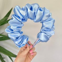 Pale blue satin scrunchie crown head band.  On a super comfy Alice band Alice Band, Tela, Sewing Headbands, Blue Scrunchie, Party Projects, Gift Wrapping Services, Head Band, Blue Satin, Hair Art