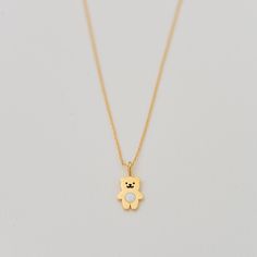 "A simple dainty enamel Teddy Bear pendant necklaces are gorgeous to layer up with your favourite pieces and look great with any outfit. D E T A I L S - Bear size: 9x12 mm - Adjustable length from 16 to 18 inches - Available in gold and silver finish - Optional 6mm hand-stamped initial tag (as seen in photo 7) or a tiny birthstone at the back of the chain (as seen in photo 8) - Each necklace will come in a lovely little gift box, ready for gift giving. - The listing is for one necklace. - All ou Dainty White Charm Necklaces For Gifts, Dainty White Charm Necklace For Birthday Gift, Dainty White Charm Necklaces For Birthday Gift, Cute Yellow Gold Necklace For Gift, Dainty White Necklace For Gift, Minimalist White Necklace For Birthday, Dainty Charm Necklaces For Birthday, Cute Gold Birthstone Jewelry, Cute Gold Jewelry For Birthday