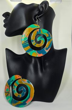 These earrings are beautifully hand painted. They are completely unique in style and color combinations. No two pairs are identical. These earrings measure 3.4 inches in length. Multicolor Hand Painted Earrings, Unique Colorful Earrings For Gifts, Unique Colorful Design Earrings As Gift, Trendy Hand Painted Polymer Clay Earrings, Hand Painted Yellow Artsy Earrings, Yellow Hand Painted Artsy Earrings, Unique Colorful Earrings With Ear Wire, Trendy Handmade Multicolor Plug Earrings, Trendy Multicolor Handmade Plug Earrings