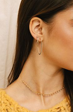 These polished 14-karat-gold hoops are each punctuated by five prong-set diamonds. 1/2" hoop diameter Total diamond weight: 0.11ct. Color: G–H Clarity: SI 14k gold/diamond Imported >Diamond Guide Second Piercings, Dana Rebecca Designs, Second Piercing, Diamond Guide, Diamond Hoop Earrings, Gold Hoops, G H, Pave Diamonds, Prong Setting