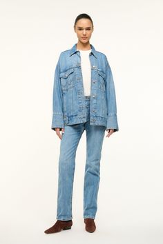 The Biggest Jean Jacket is our oversized must-have jacket from the Wrangler + STAUD collection. Drop shoulder and exaggerated cuff create a laid-back look, featuring our STAUD belt loop detailing. Long Sleeve Rigid Denim Outerwear For Fall, Classic Rigid Denim Outerwear For Fall, Medium Wash Relaxed Fit Rigid Denim Outerwear, Relaxed Fit Blue Denim Outerwear, Fall Denim Blue Rigid Denim Outerwear, Medium Wash Long Sleeve Rigid Denim Outerwear, Long Sleeve Medium Wash Rigid Denim Outerwear, Medium Wash Rigid Denim Outerwear For Fall, Fall Medium Wash Rigid Denim Outerwear