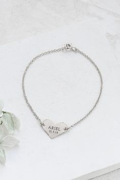 Beautiful bracelet with a dainty heart, hanging on a delicate disc chain, on which a letter, name, word, or number in English. The engraving is made by laser and is delicate and precise. You can choose to engrave one, two or three words. The price will vary according to the number of words engraved. Please write the text you wish to engrave in the comment box. The jewelry is made of high-quality 14k yellow or white gold, according to your choice. Please note that since this item is custom made a Heart Bracelet Gold, Gold Name Bracelet, Gold Heart Bracelet, Mountain Necklace, Geometric Ring, Enamel Ring, Name Bracelet, Engraved Jewelry, Travel Jewelry