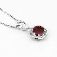 "Garnet Pendant, Natural Red Garnet Round and White Diamonds Pendant Necklace in Sterling Silver & 14K Yellow Gold, January Birthstone Flaunt Yourself With This Garnet And White Diamond halo Pendant. The Natural Gemstones Have A Combined Weight Of 2.32 Carats And Are Set In 14K Yellow Gold With .925 Sterling Silver. The Red Hue Of This Pendant Necklace Adds A Pop Of Color To Any Look! The Understated Design And Vibrant Stones Makes This Pendant Necklace Perfect For Every Occasion. Product De Red Ruby Gemstone Necklace, Red Ruby Gemstone Necklaces, Fine Jewelry Red Ruby Necklace, Red Ruby Necklace With Gemstone Accents, Red Lab-created Ruby Necklace As Gift, Red Lab-created Ruby Necklace For Gift, Red Lab-created Ruby Necklace Gift, Classic Red Pendant Necklace, Gift Red Lab-created Ruby Necklace