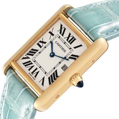 Cartier Tank Louis Yellow Gold Teal Leather Strap Mens Watch W1529756. Quartz movement. 18k yellow gold case 25.0 x 33.0 mm. Circular grained crown set with a blue sapphire cabochon. . Scratch-resistant mineral crystal. Silvered opaline dial with black radial Roman numeral hour markers and inner minute track. Sword shaped blue hands. Date calendar at 3 o'clock aperture. Secret Cartier signature at VII. Teal leather strap with 18K yellow gold tang buckle. Vintage Cartier Yellow Gold Watch, Vintage Yellow Gold Cartier Watch, Vintage Gold Cartier Watch Accessories, Vintage Cartier Gold Watch Accessories, Cartier Gold Watches For Formal Occasions, Classic Yellow Gold Watch Bands With Rectangular Dial, Cartier Gold Watch With Rectangular Dial, Gold Cartier Watch With Rectangular Dial, Luxury Gold Cartier Watch