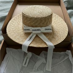 100% Natural Wheat Straw Structured Boater Trimmed With Caramel Tonal Soft 100% Genuine Suede Band. Brim Measures 8 Cm / 3.15”. The Highest Achievable Sun Protective Rating For Fabrics, Our Upf 50+ (Australian Tested) Hats Offer Unbeatable Sun Protection. Please Note, Color Of Straw May Vary From Piece To Piece Due To The Organic Nature Of The Straw. Ribbon Replaced With Authentic Chanel Ribbon Never Worn Size Small 55cm Tan Beach Hat For Spring, Tan Vacation Hats For Spring, Tan Vacation Hat For Spring, Sun Hat, Boater Hat Women, Derby Hat, Floppy Hats, Wheat Straw, Wide Brim Sun Hat