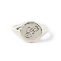 An elegant Script Initial engraved onto our bold Signet Ring. Good weight with a smooth comfort fit polish. Sterling Silver Hypoallergenic, lead and nickel free Diameter 10mm Band Thickness 2mm #R010 Everyday Engraved Initials Open Ring, Minimalist Initial Ring With Engraving Option, Luxury Silver Initial Open Ring, Silver Timeless Initial Ring For Anniversary, Timeless Silver Initial Ring For Anniversary, Minimalist Engraved Ring With Engraving Option, Timeless Silver Initial Ring For Formal Occasions, Luxury Silver Open Initial Ring, Timeless Silver Signet Ring For Wedding