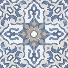 a blue and white tile pattern with an intricate design on the bottom half of it