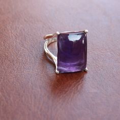 Gemstone - Amethyst Size - 13x18 rectangle Metal - sterling silver Natural purple amethyst ring available in all ring sizes Amethyst strengthens the aura of the wearer and creates your dominance among others The same design also available with many other gemstones please visit my shop to view the complete collection. feel free to contact me for any query regarding my jewelry Each order will be packed in the free handmade jewelry box Formal Birthstone Ring With Rectangular Stone, Formal Purple Amethyst Ring With Rectangular Shape, Formal Rectangular Purple Amethyst Ring, Formal Rectangular Amethyst Ring, Elegant Rectangular Amethyst Ring For Formal Occasions, Classic Purple Rectangular Rings, Rectangular Amethyst Ring With Accent Stones, Purple Rectangular Stone Ring For Anniversary, Purple Rings With Rectangular Stone For Anniversary