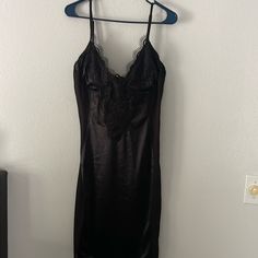 Sexy Black Satin Dress. See-Through Mesh Material On The Sides Of The Dress. Very Flattering. Size L Black Lace Trim Backless Slip Dress, Black Dress With Built-in Bra For Night, Flirty Black V-neck Slip Dress, Black Satin Flirty Slip Dress, Flirty Black Satin Slip Dress, Black Bodycon Slip Dress For Night Out, Black Bodycon Slip Dress For Date Night, Black Fitted Slip Dress For Club, Fitted Black Slip Dress For Club