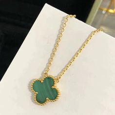 CLOVER MALACHITE NECKLACE – 79karat.co Elegant Green Flower Pendant Necklaces, Elegant Green Flower Pendant Necklace, Luxury Green Malachite Necklace, Luxury Green Pendant Necklace, Luxury Malachite Necklaces For Gifts, Luxury Green Emerald Gold-plated Necklace, Elegant Malachite Pendant Necklace, Elegant Green Malachite Necklace, Elegant Yellow Gold Malachite Necklace