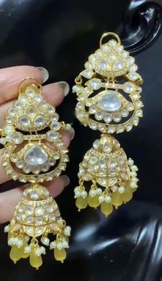 Polki Jhumka/Polki Kundan Jhumki/Jhumka/Bollywood Earrings/High Quality Earring/ Indian Jewelry/Pakistani Jewelry/Punjabi Jewelry New design premium brass quality, antique gold polish 100% Handmade Packed in a nice Box with cotton lining, Best for gifting to loved ones.. A personal note for your loved ones can be added. *Since this is 100% Handmade jewelry. So Color, shades, texture displayed may slightly vary from the actual product due to digital image limitations. We request you to consider t Bollywood Earrings, Kundan Jhumka, Punjabi Jewelry, Earring Indian, Jewelry Pakistani, Pakistani Jewelry, Gold Polish, Color Shades, Indian Jewelry