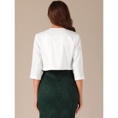 This jacket features an open front design that effortlessly drapes over your silhouette. The lapel collar adds a touch of elegance and professionalism, making it perfect for business and office wear. The cropped length of the jacket gives it a modern and trendy twist, allowing you to pair it with high-waisted pants, skirts, or dresses for a fashion-forward look. The classic fit silhouette enhances your figure without compromising comfort. Made from quality materials, this jacket is lightweight a Tailored Elegant Spring Cardigan, Elegant White Open Front Cardigan, Elegant Tailored Spring Cardigan, Tailored Spring Cardigan For Formal Occasions, Elegant Fitted Cardigan For Work, Tailored Chic Formal Cardigan, Chic Tailored Cardigan For Formal Occasions, Formal Chic Tailored Cardigan, Elegant Open Front Cardigan For Work