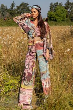 Experience the epitome of style with our colorful maxi long sleeve set. This designer ensemble features a flowy V-neck top paired with matching bottoms. With its vibrant colors and aesthetic design, it's perfect for those who appreciate fashion with a flair. Features: 🌈 Colorful Design 👚 Flowy V-Neck Long Sleeve Top 👖 Coordinating Bottoms 🎨 Aesthetic and Trendy Order now for a captivating and fashionable addition to your wardrobe! MODEL INFO: Our model is 5'8 (173 cm.) and wearing size S. SI Multicolor Two-piece Pant Set For Summer, Bohemian V-neck Sets For Spring, Spring Two-piece Long Sleeve Sets, Bohemian Sets With Multicolor Kimono Sleeves, Chic Long Sleeve Pant Set For Summer, Spring Matching Set With Long Sleeve, Floral Print Long Sleeve Sets For Spring, Spring Sets With Floral Print And Long Sleeves, Pink Long Sleeve Pant Set For Spring